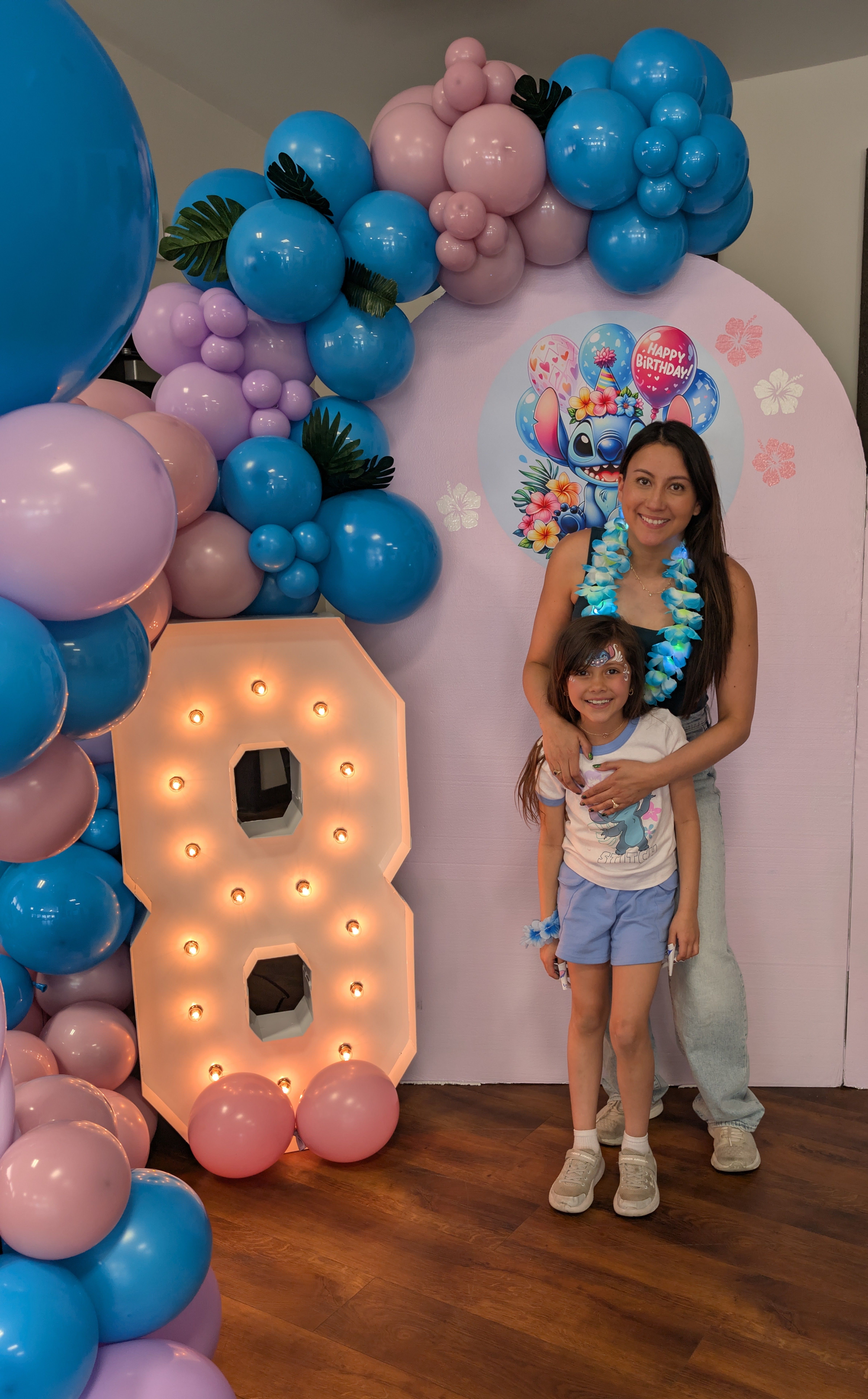 Andrea with her daughter at a Lilo & Stitch themed 8th birthday celebration